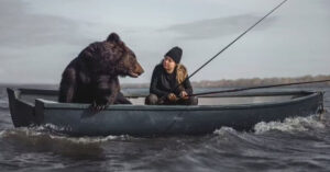 Read more about the article A Russian woman and her big friend love to fish in the same boat together.